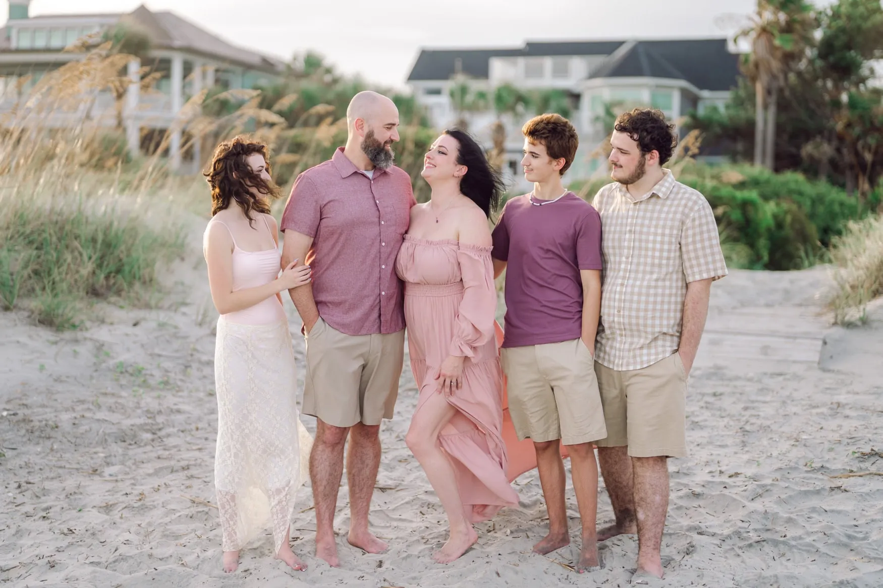 Large extended family gathered on the sand