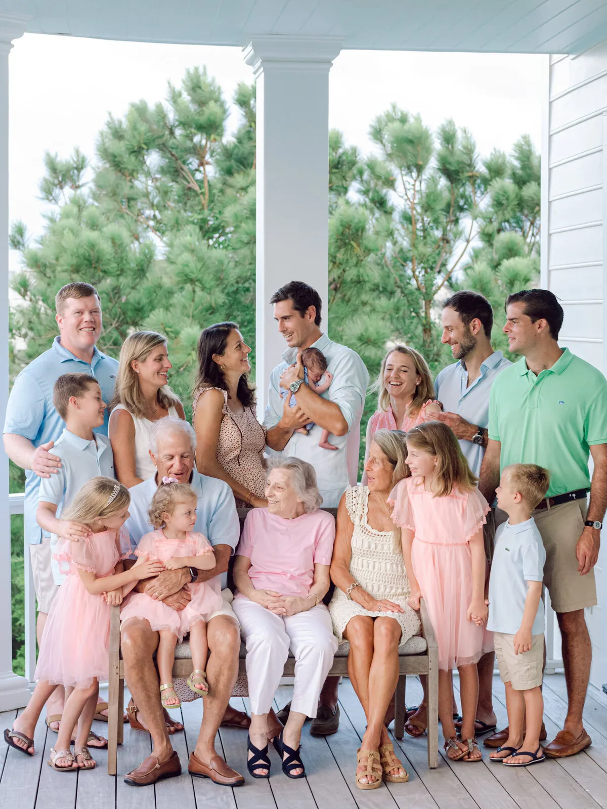 Big family gathered on a porch at DeBordieu Colony in Georgetown SC
