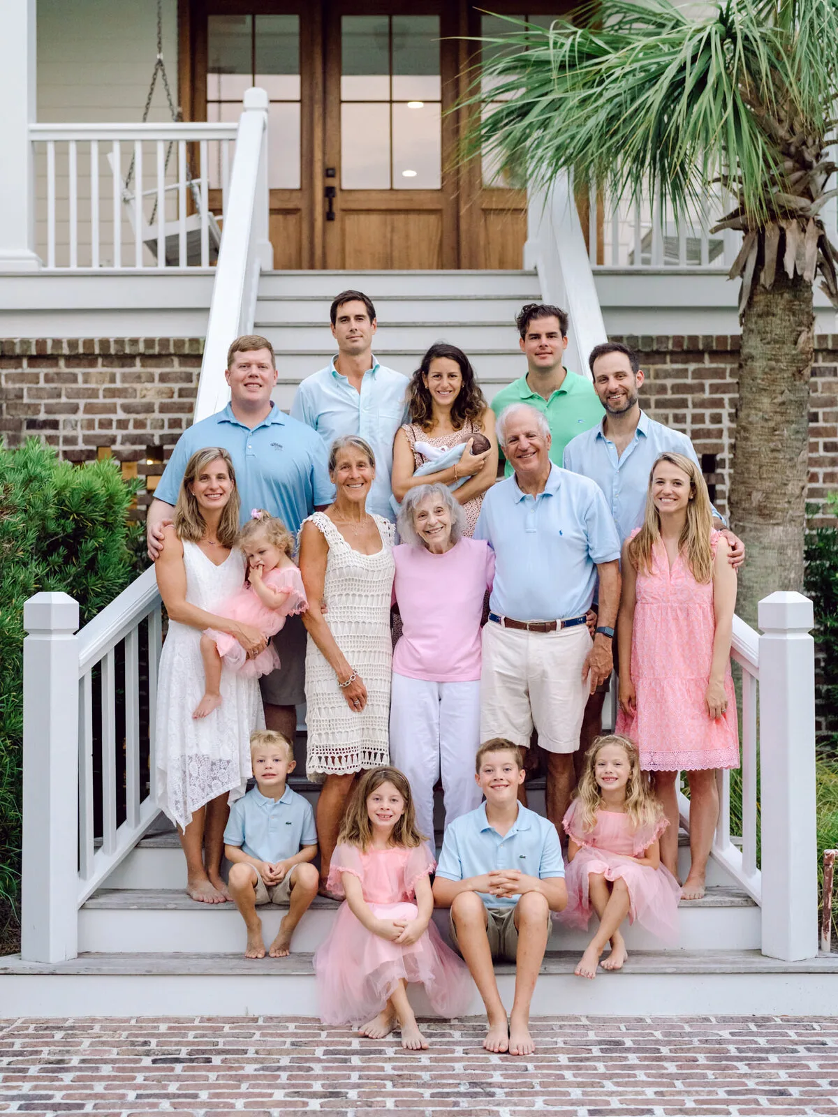 Large family on a beach house staircase at DeBordieu Colony in Georgetown SC