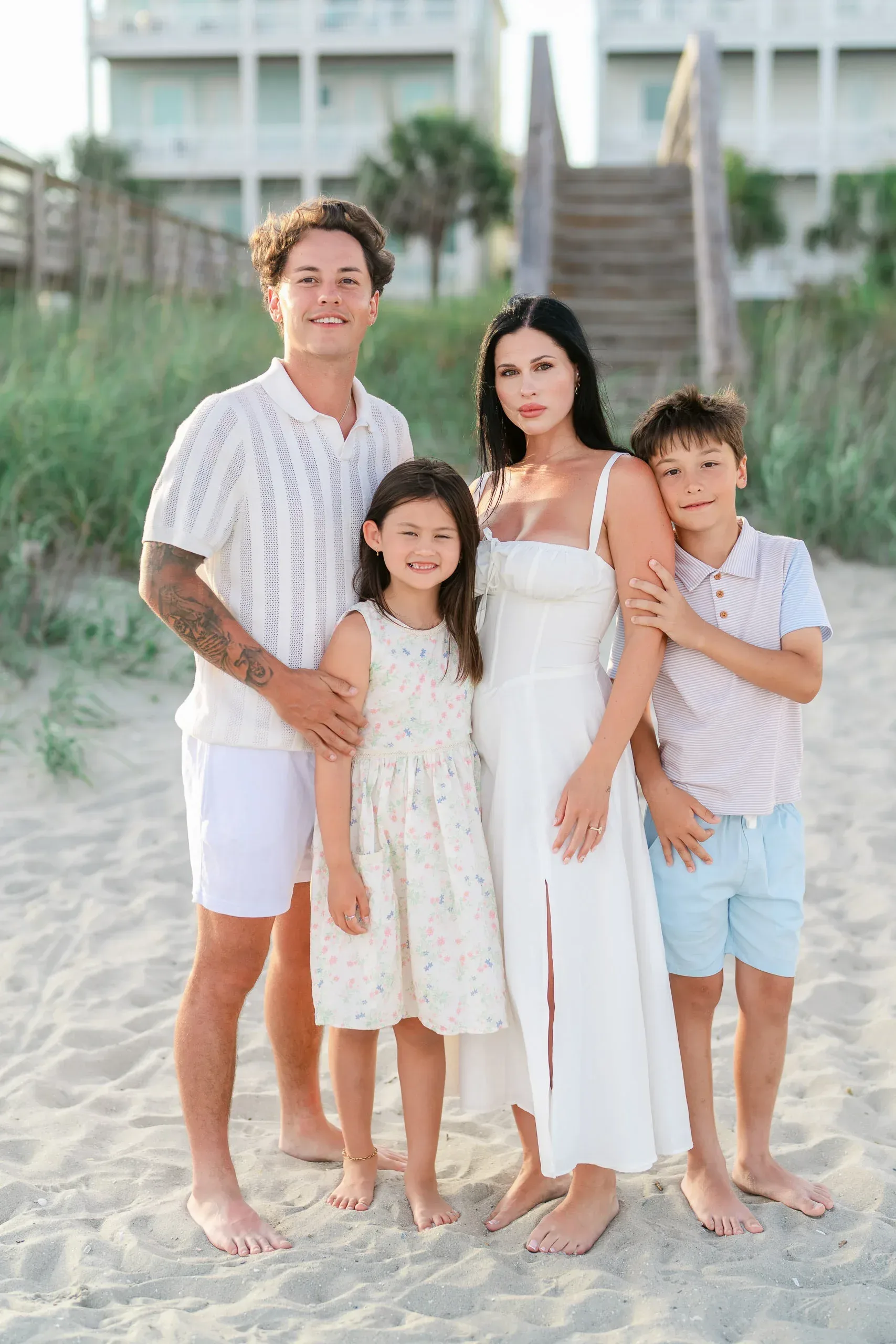 Family with their teenage children by the dunes by Pasha Belman Photography