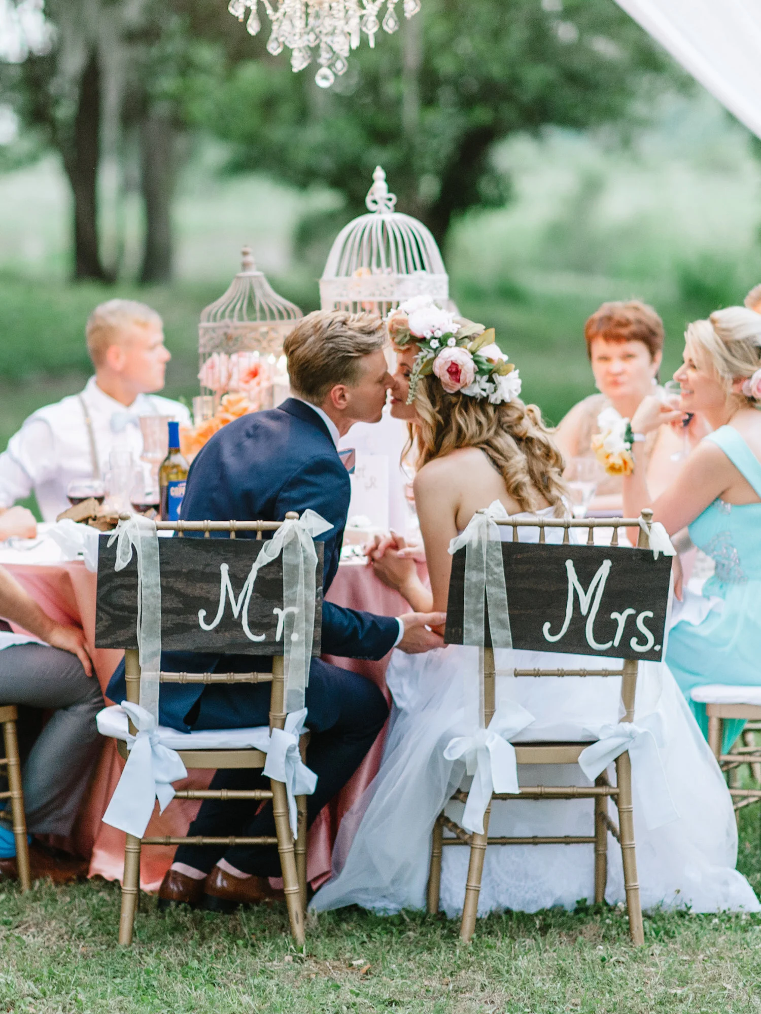 Bride and groom at the sweetheart table during the reception