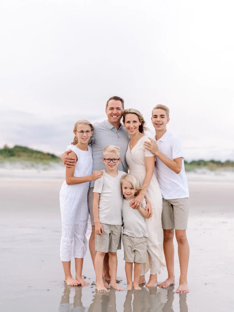 Family of six on the beach by the dunes in North Myrtle Beach