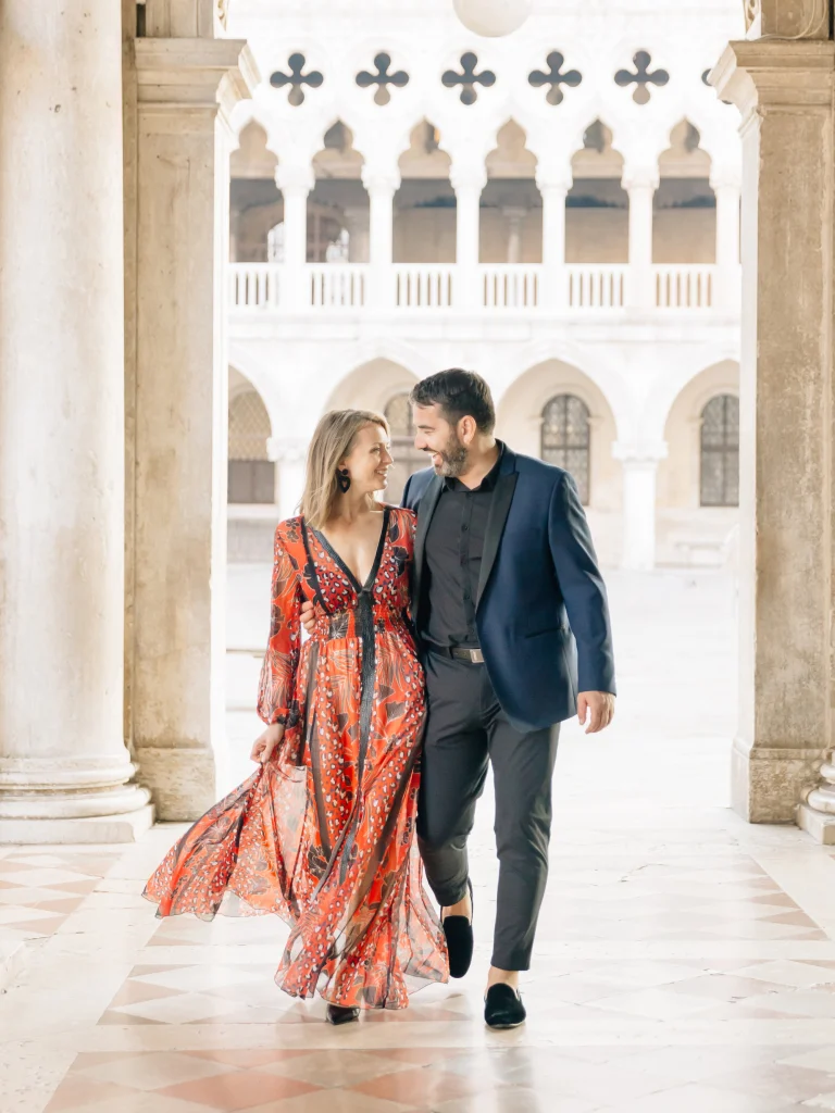 Pasha and Natallia Belman walking together in Venice, Italy