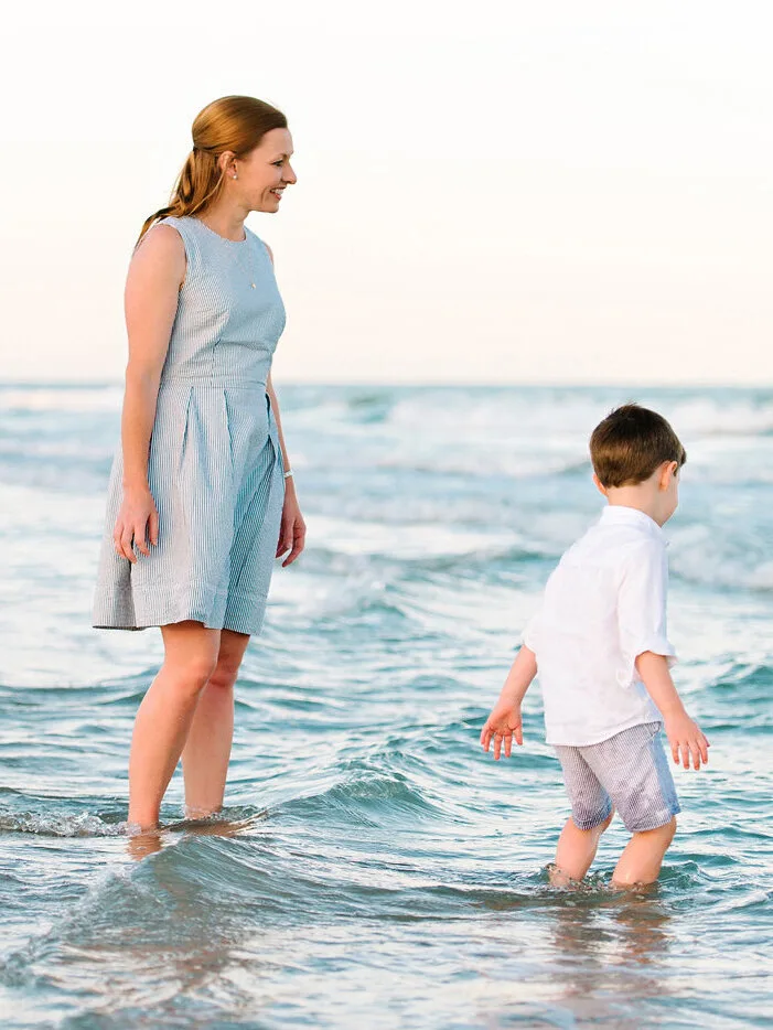 Mother and son playing in the waves at Pawleys Island beach